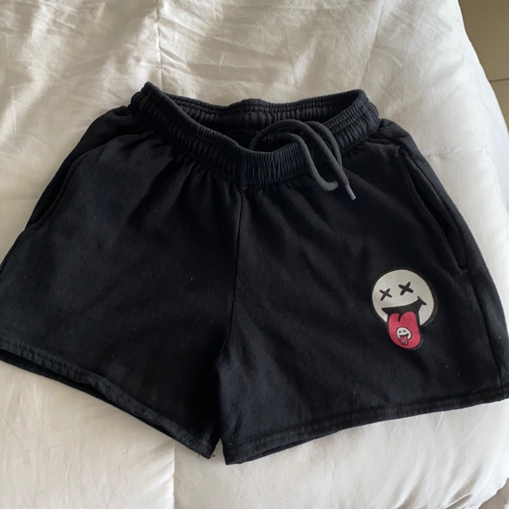 Louis Tomlinson smiley face shorts July 28th merch